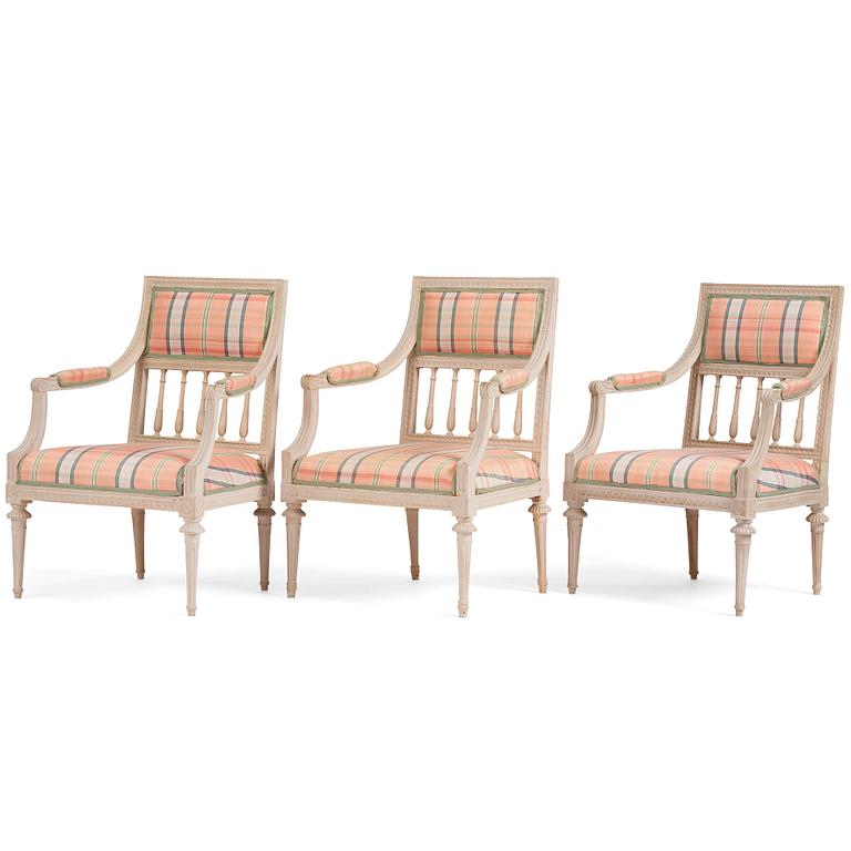 A set of three late Gustavian open armchairs, late 18th century.