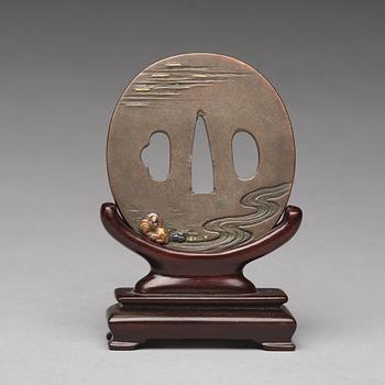 A Japanese bronze Tsuba, signed presumably by Yano Ysunenano, Edo period (1603-1868).