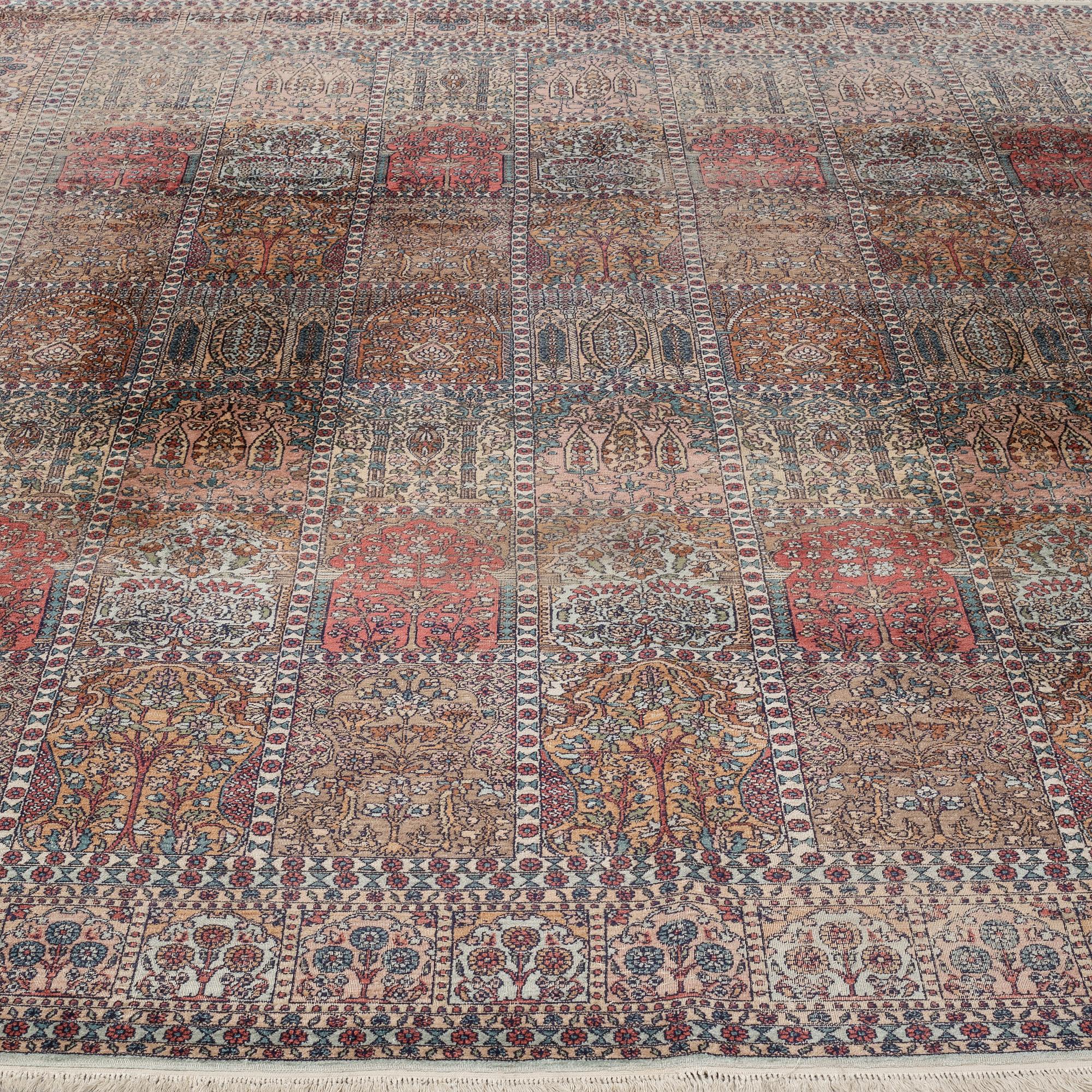 A CARPET, silk Kashmir, ca 315 x 240 cm.