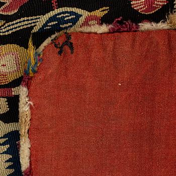 A carrige cushion, "Urnor och par", tapestry weave, ca 105 x 46 cm, around the years 1790-1810.