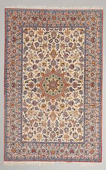 An oriental rug. Circa 236x151 cm.