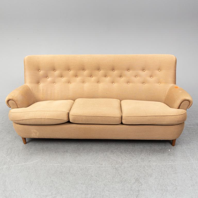 A 'Hemmakväll' sofa by Carl Malmsten.