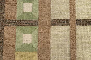 A flat weave carpet, signed, ca. 243 x 165 cm.