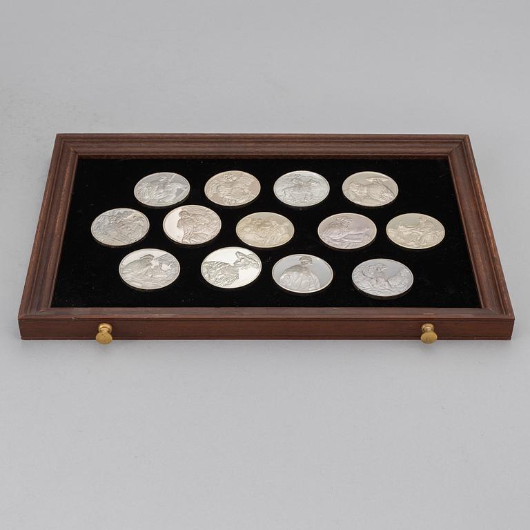 A set of 50 Sterling silver medals from Franklin Mint.