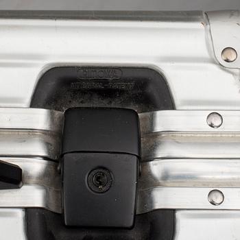 A set of three Rimowa bags later part of the 20th century.