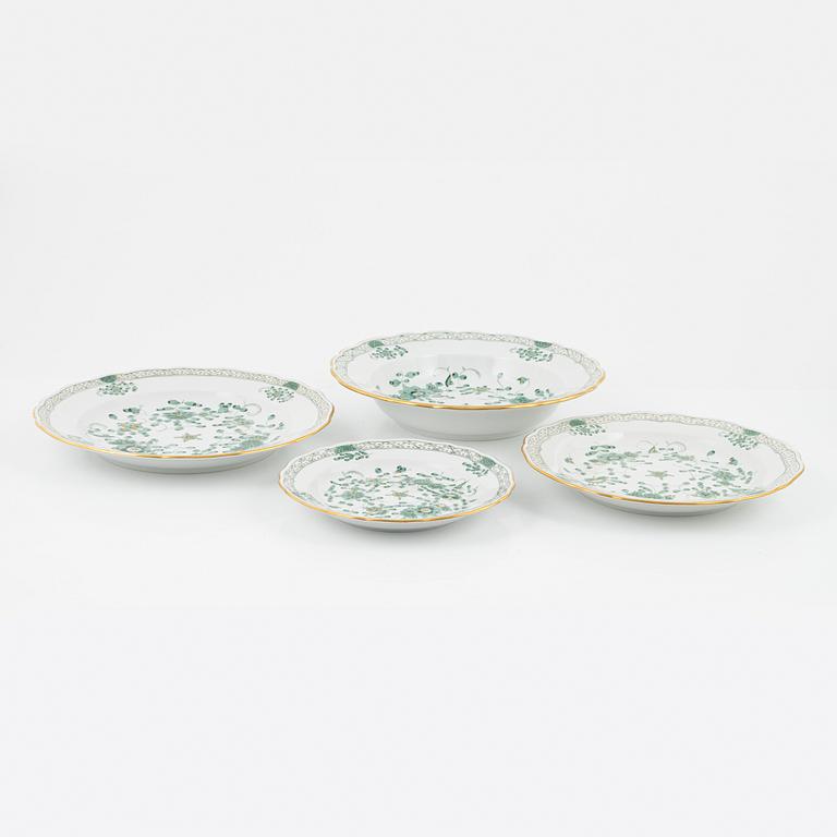 An 83-piece 'Indische Malerei Grün' dinner and coffee porcelain service, Miessen, 20th Century.