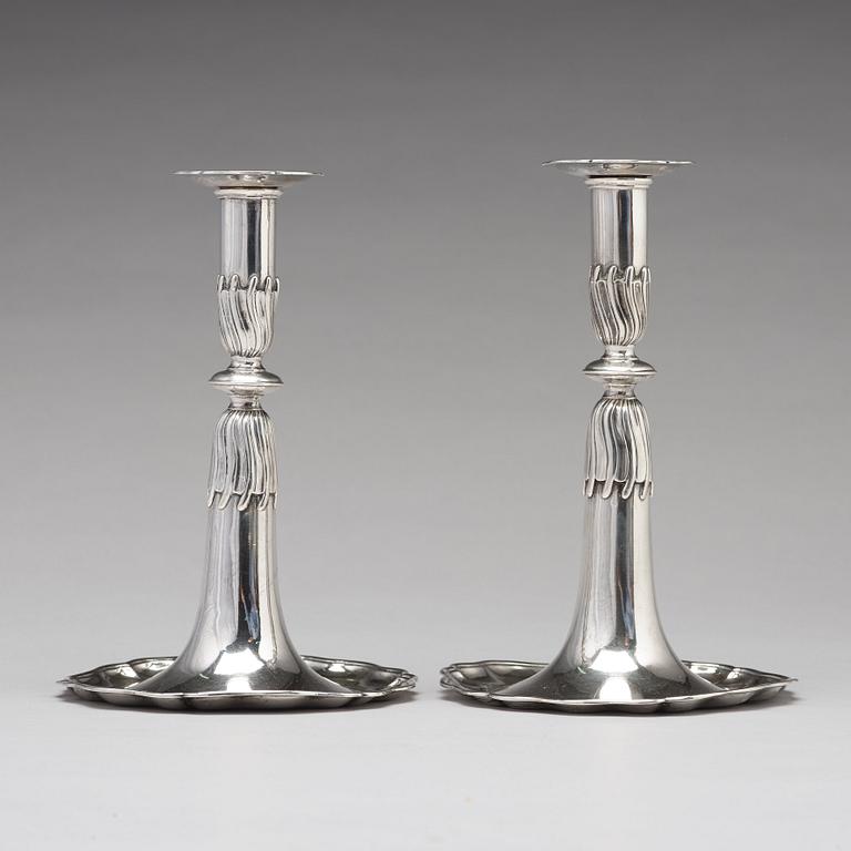 A pair of Swiss 18th century silver candlesticks, unidentified makers mark, Lausanne.