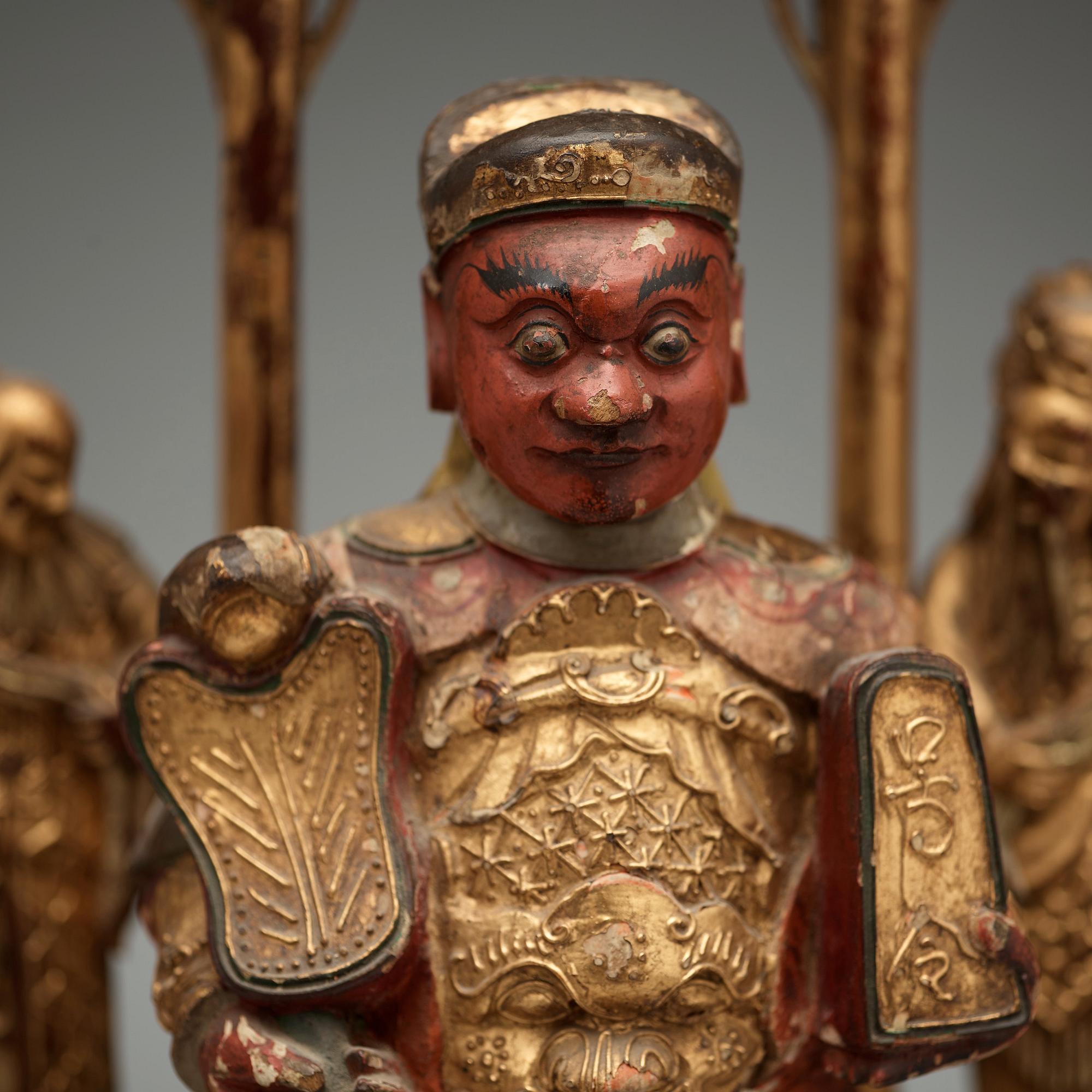 A Chinese sculpture group, Qing dynasty, 19th Century.