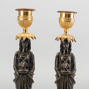 A pair of Louis XVI 18/19 century candlesticks.