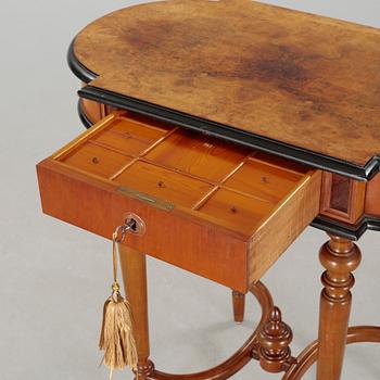 A sewing table, late 19th century.