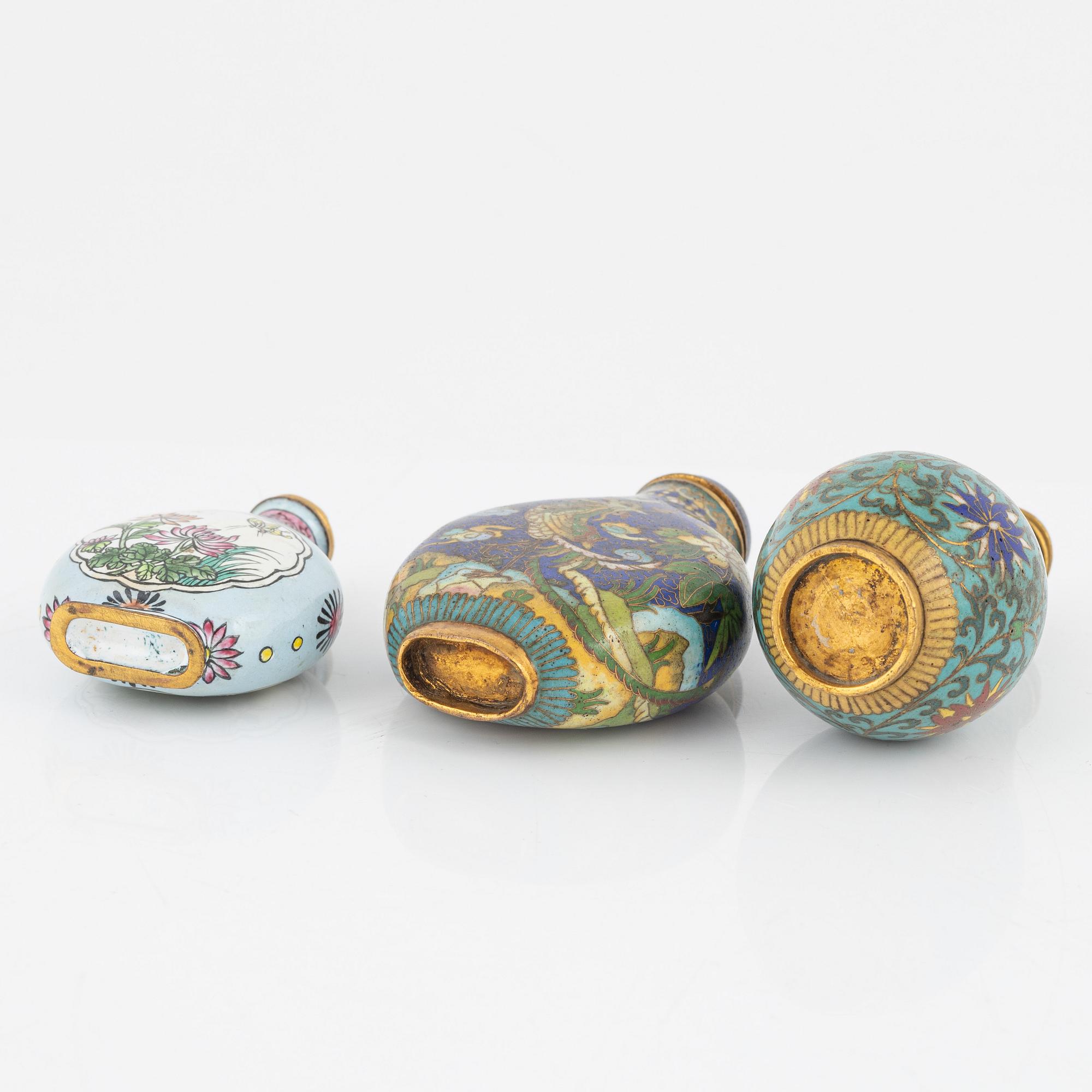 Ten snuff bottles, stone, glass and cloisonné, China, 20th century.