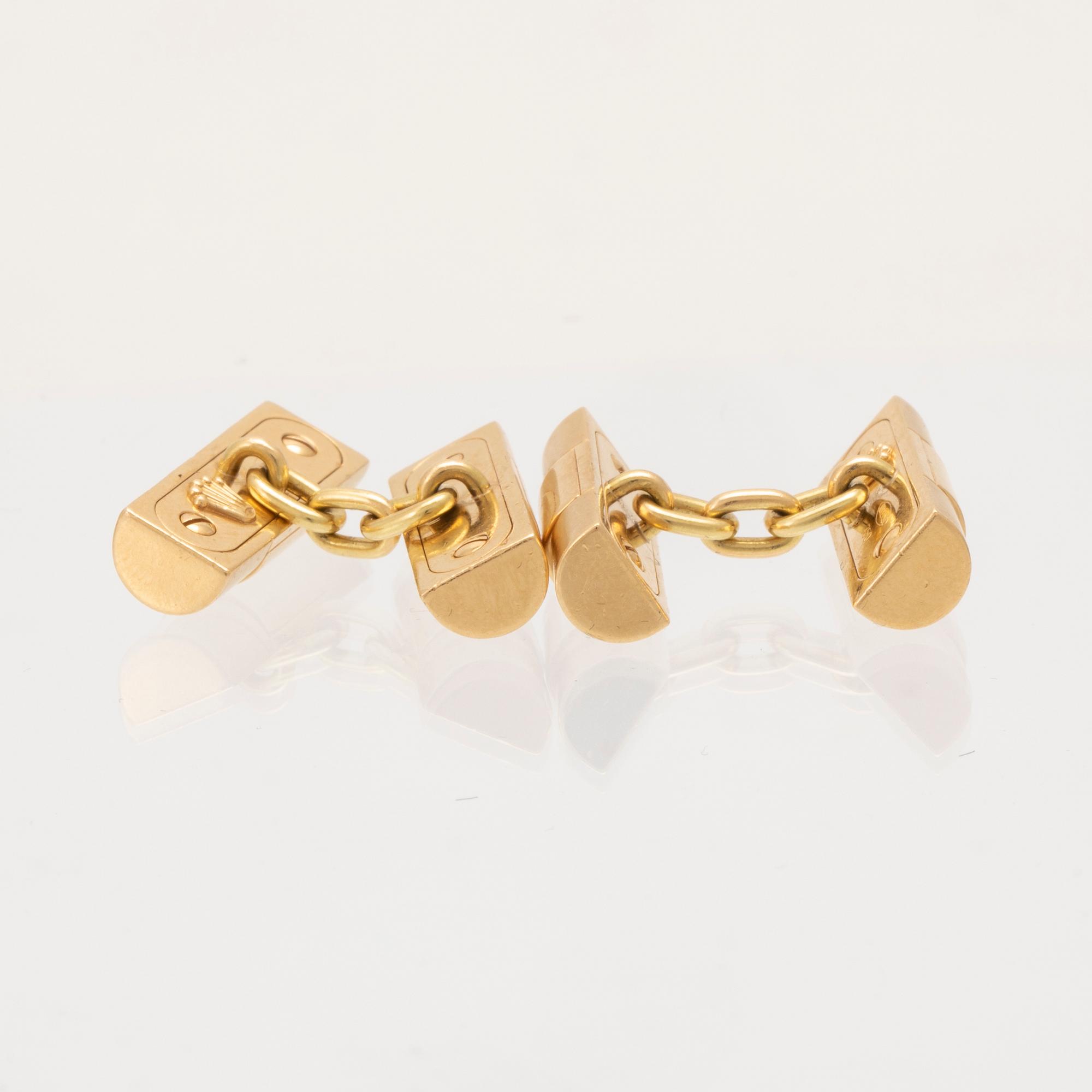 Rolex, manschettknappar ett par 18K guld.