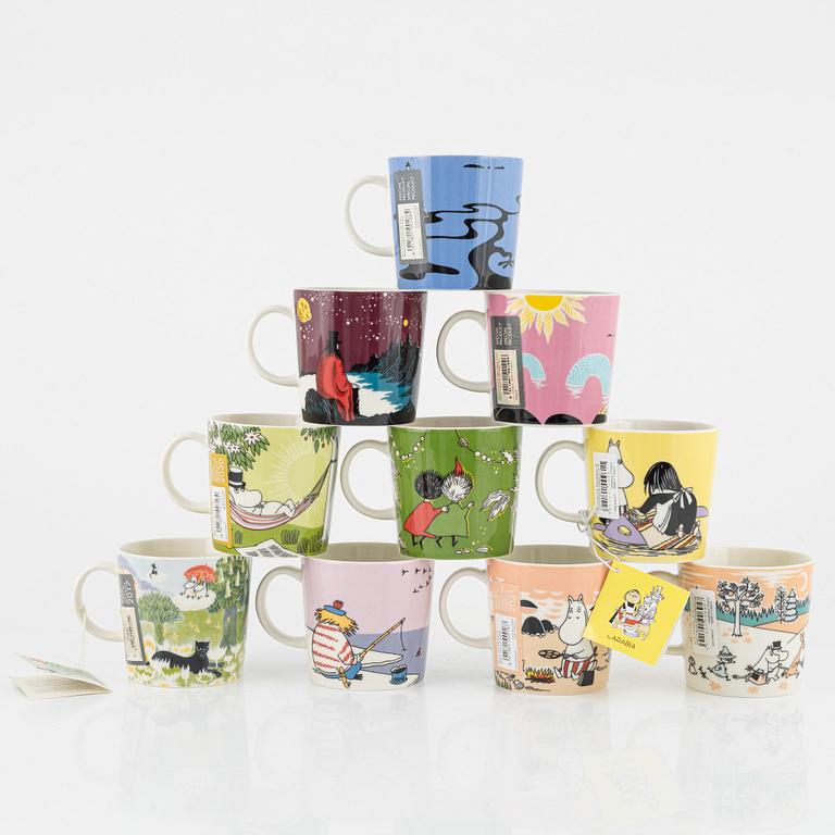 Eleven porcelain Moomin mugs, Arabia, Finland.