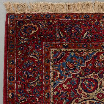 Matto, a semi-antique silk Kashan, ca 212,5-214,5 x 134,5-135,5 cm.