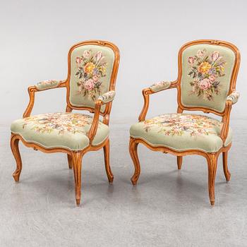 A pair of French 18th century Louis XV armchairs.