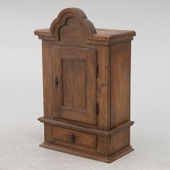 A wall cabinet, 18th/19th century.