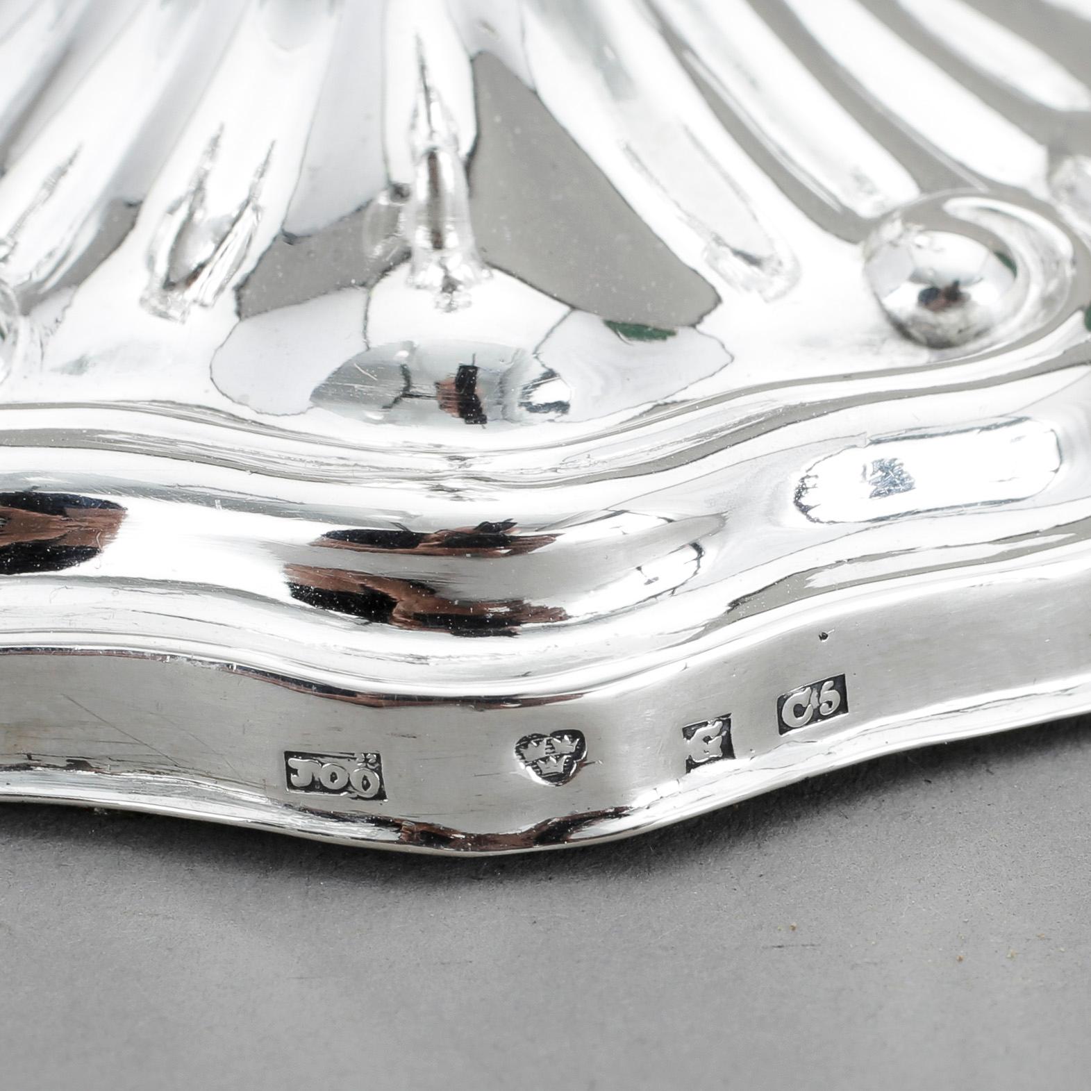 LJUSSTAKAR, ett par, silver, nyrokoko, Johan Olof Östlund, Gävle 1857.