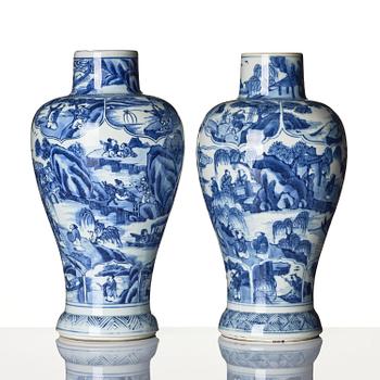 A pair of blue and white 'landscape' vases, Qing dynasty, Kangxi (1662-1722).