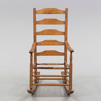 A 18th/19th century rocking chair.