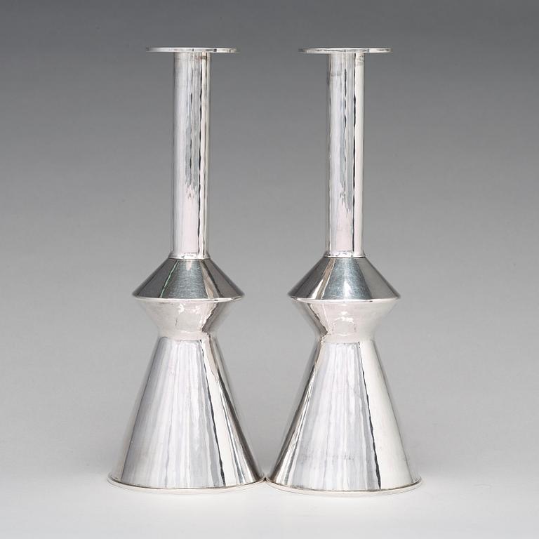 Sigurd Persson, a pair of sterling silver candlesticks, executed by the silversmith Johann Wist, Stockholm 1970.