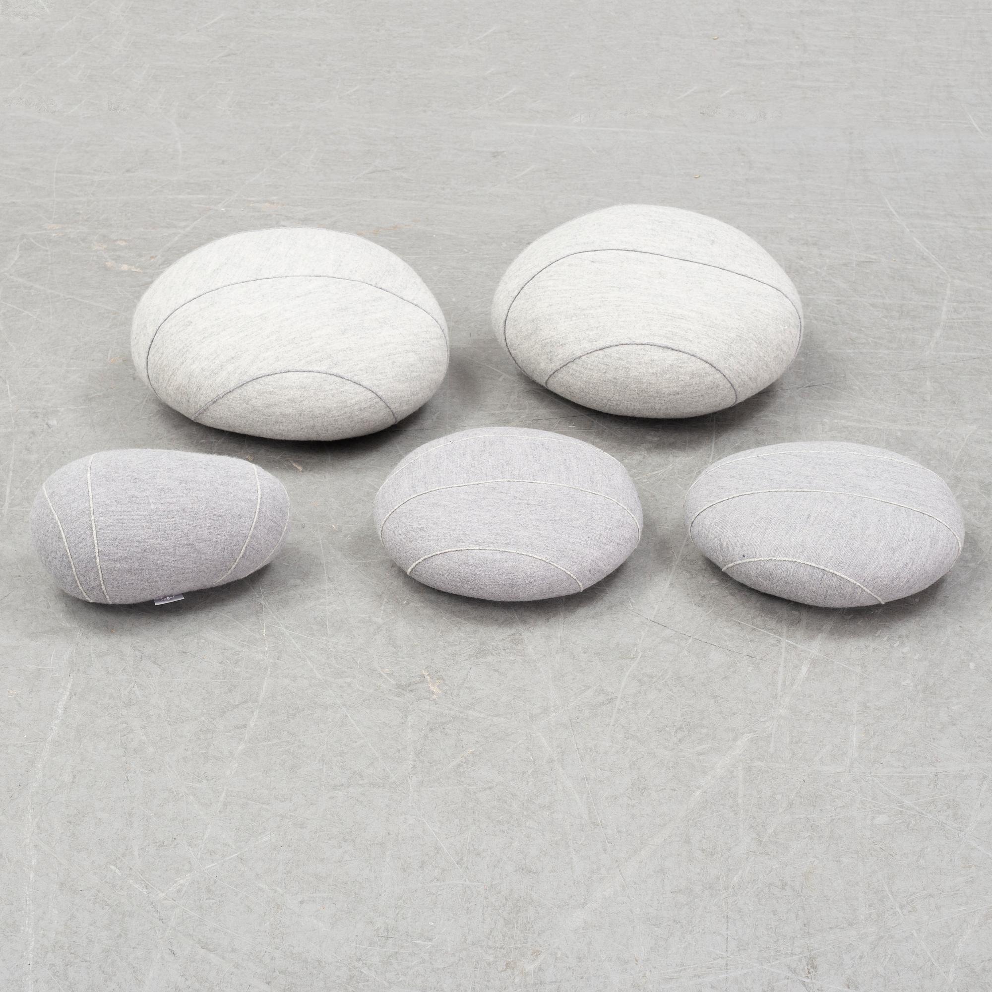 9 pebbles cushions, 'Linvingstones', Smarin, and three stools, 'Wire Log', Pols Potten.