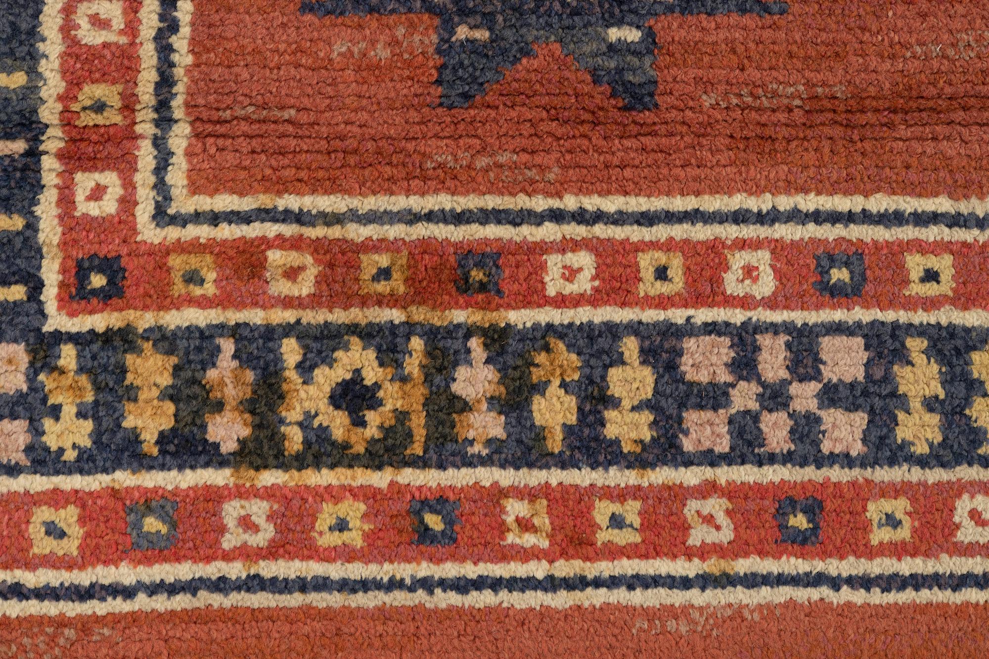 Märta Måås-Fjetterström, a carpet, "Röd Flossa", knotted pile, ca 300 x 272 cm, signed AB MMF.