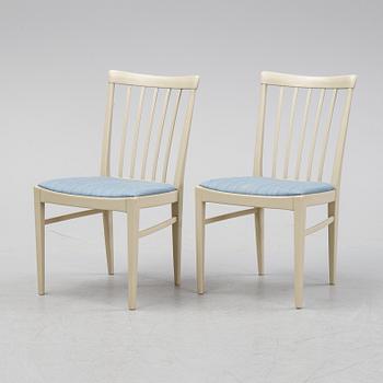 A dining table with six chairs by Carl Malmsten, second half of the 20th Century.