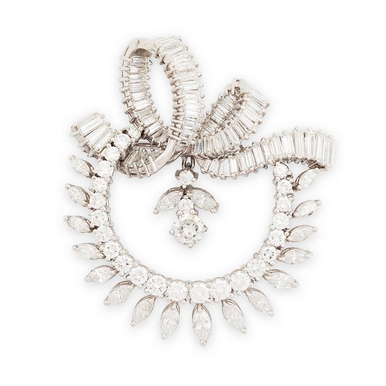 A platinum brooch set with navette-, tapered baguette- and brilliant-cut diamonds.