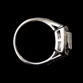 A princess and brilliant cut diamond, circa 1.03 cts ring.