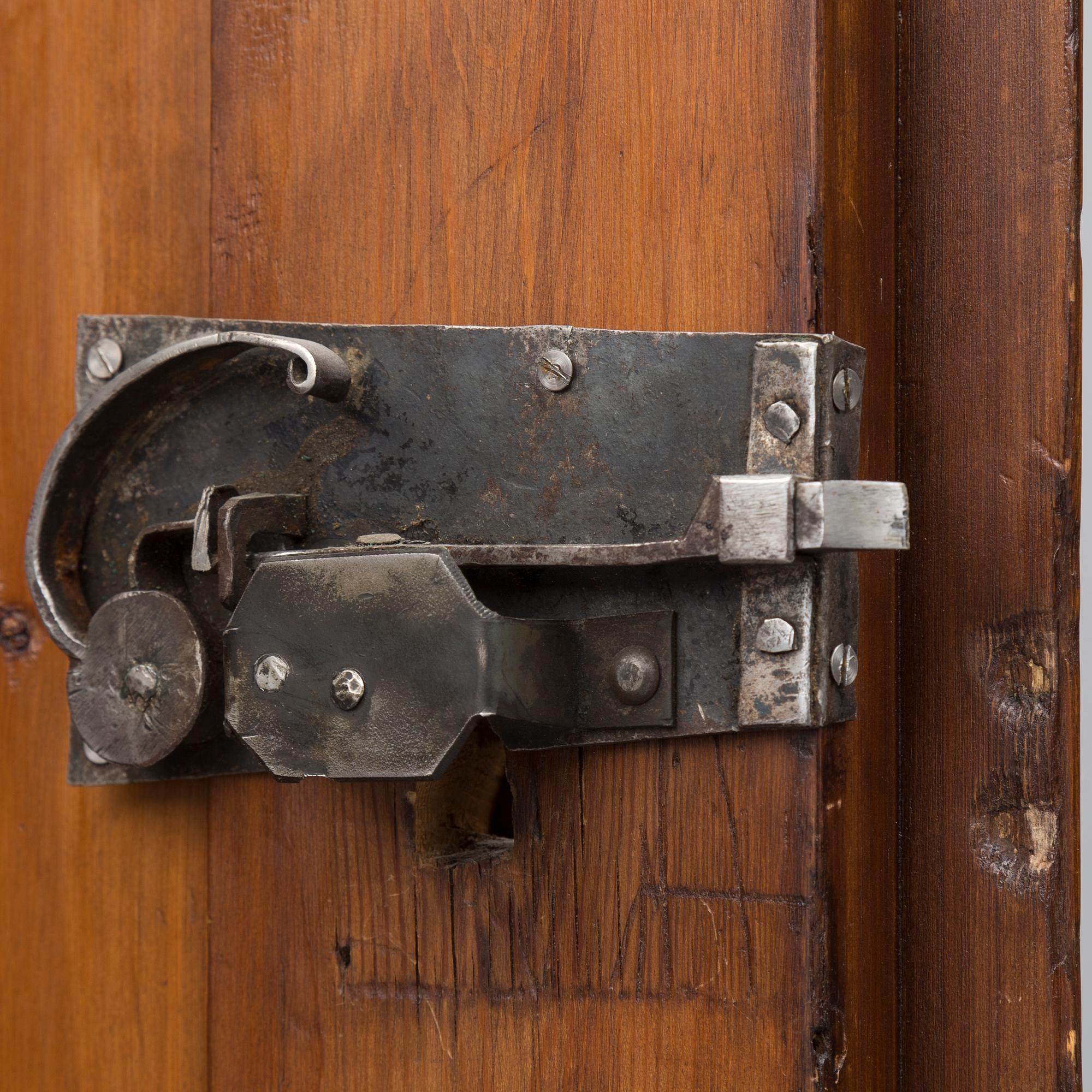 a 1700's Rococo pine cabinet.