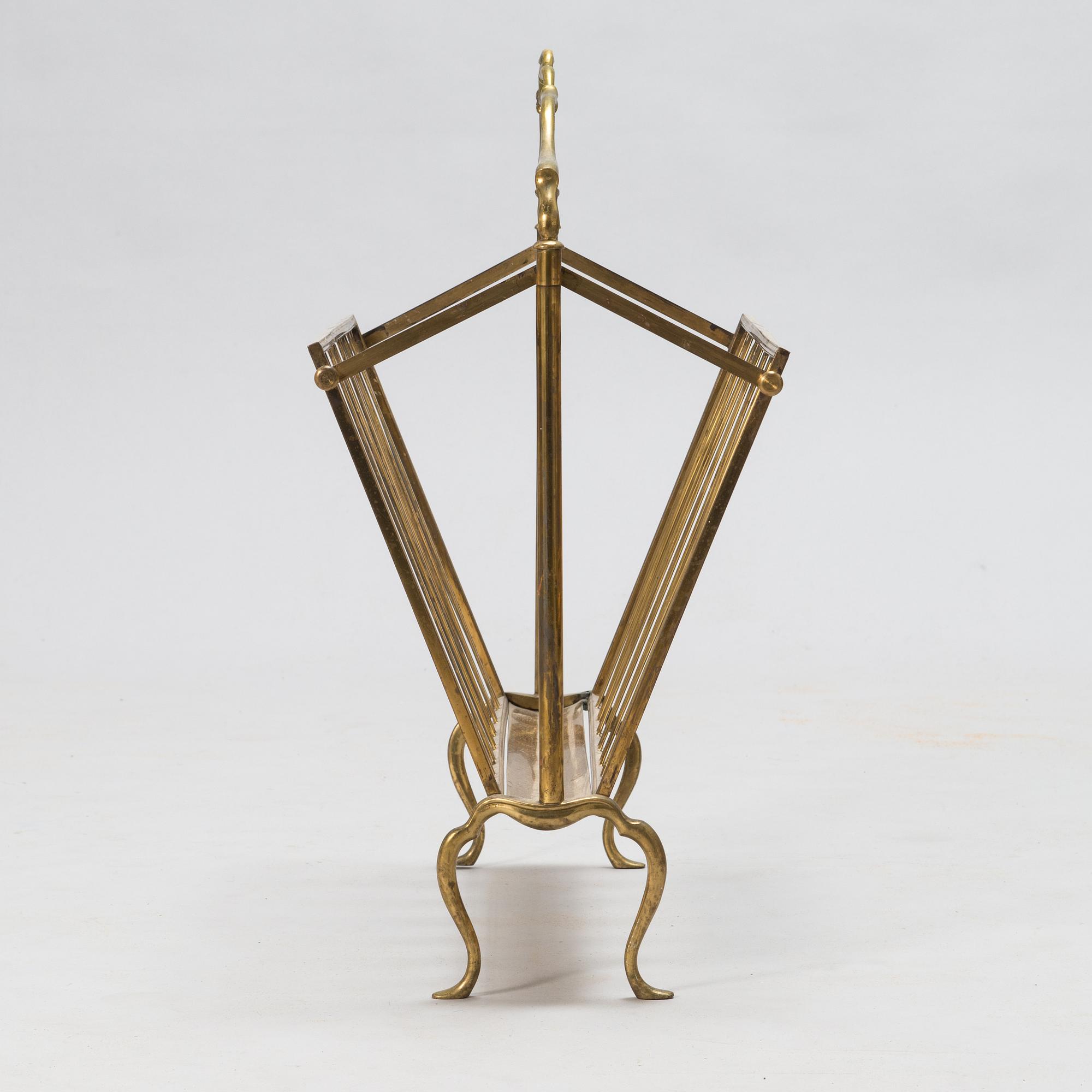 A folding brass magazine stand, first half of the 20th century.