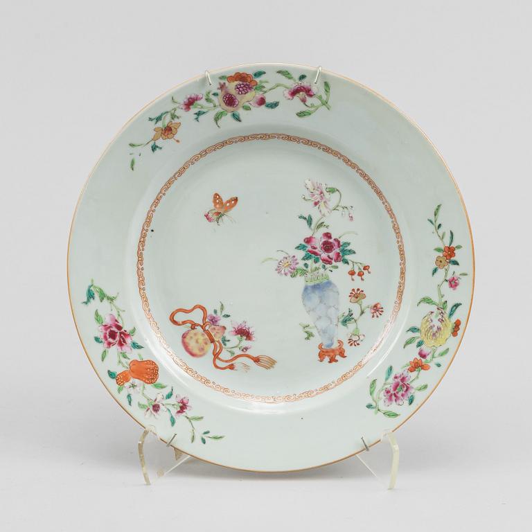A famille rose dish and two dinner plates, Qing dynasty, Qianlong (1736-95).