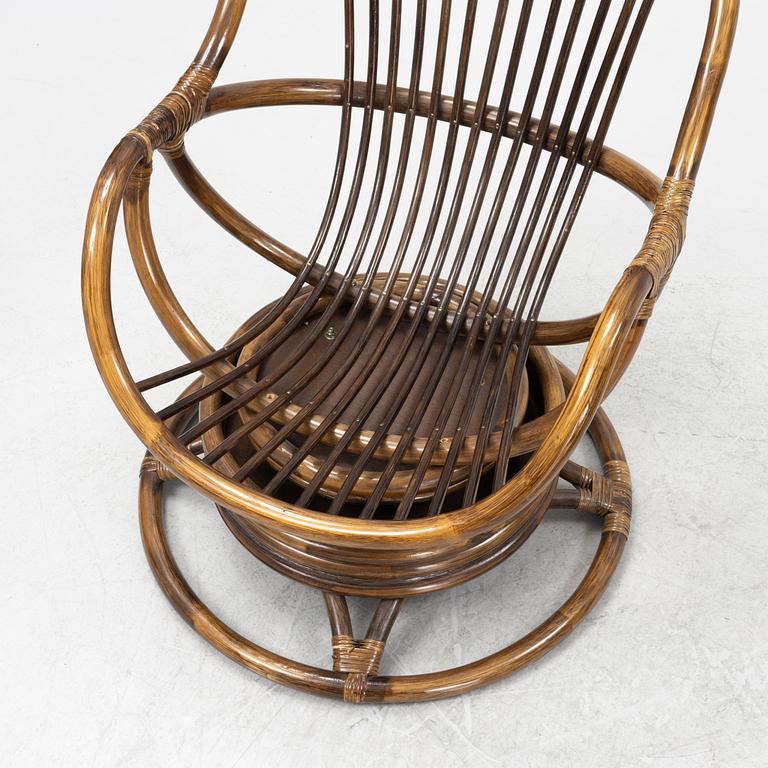 A pair of easy chairs and stools, later half of the 20th century.