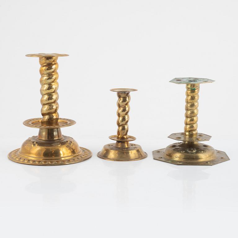 Three pair of brass Baroque style candlesticks, around 1900.