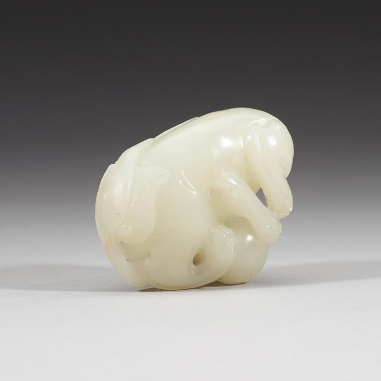 A carved nephrite figurine, presumably late Qing dynasty (1644-1912).