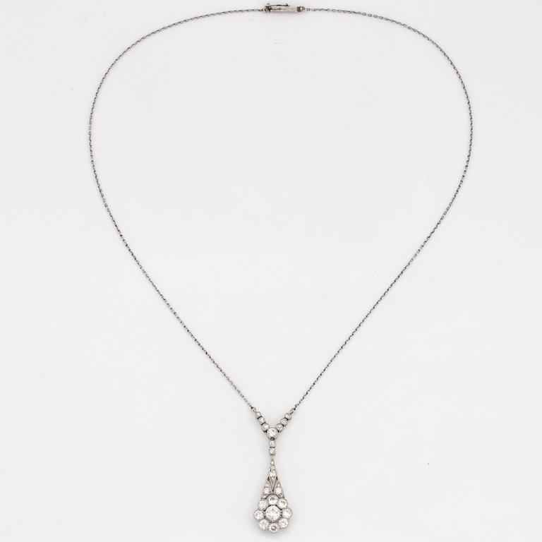 A platinum necklace set with old- and eight-cut diamonds.