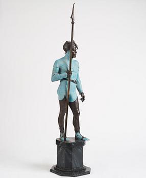 A bronze sculpture of a man in armour, late 19th century.