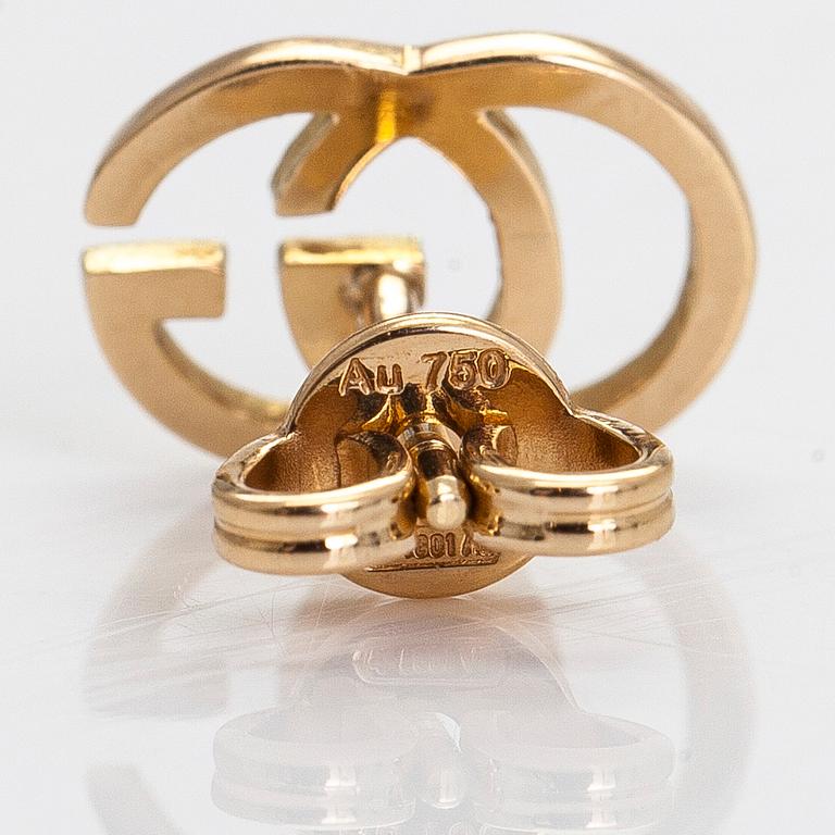 Gucci, a pair of 18K gold "GG Running" earrings.