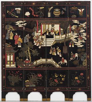A Chinese four panel lacquer folding screen, first part of the 20th century.
