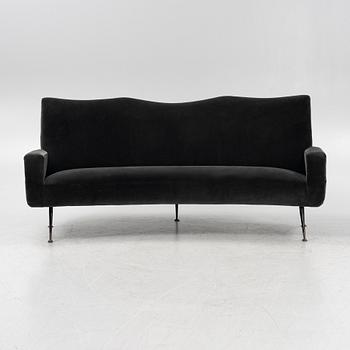 A curved sofa with velvet covering, 20th Century,