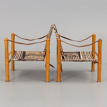 A pair of mid 20th century safari easychairs.