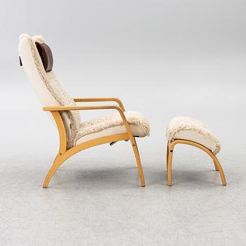 A 'Delta Adventure' armchair with footstool, Brunstad AS, Norway.