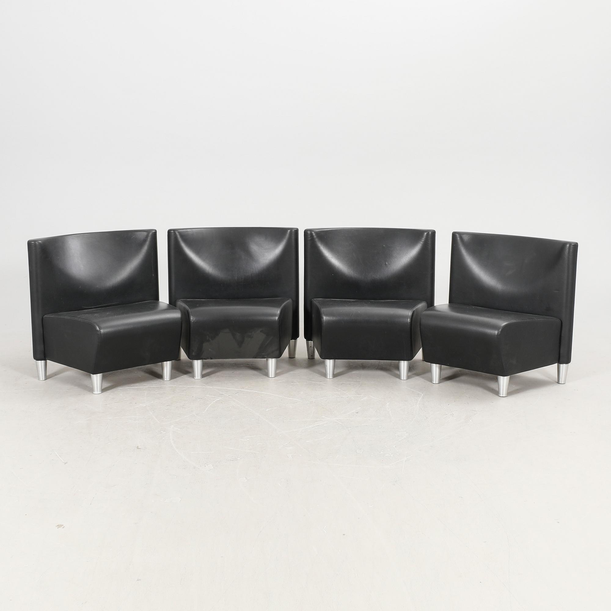 A set of eight leather easychairs by Erik Jørgensen Møbelfabrik, Svendborg, Denmark.