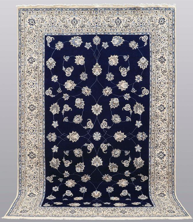 A carpet, Nain part silk s.k 9LAA, ca 312 x 199 cm.