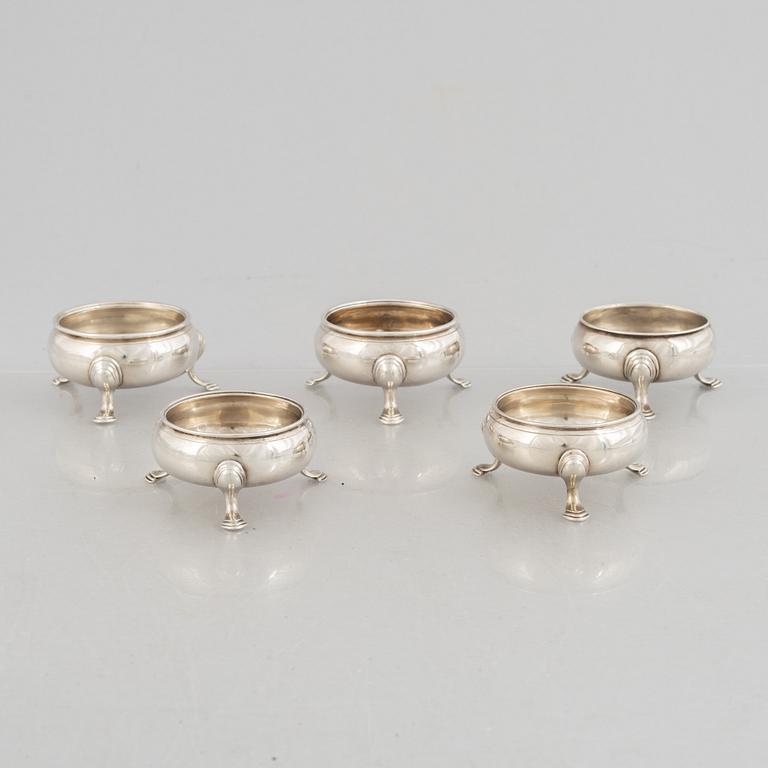 Five English silver salt cellars, circa mid 18th Century.