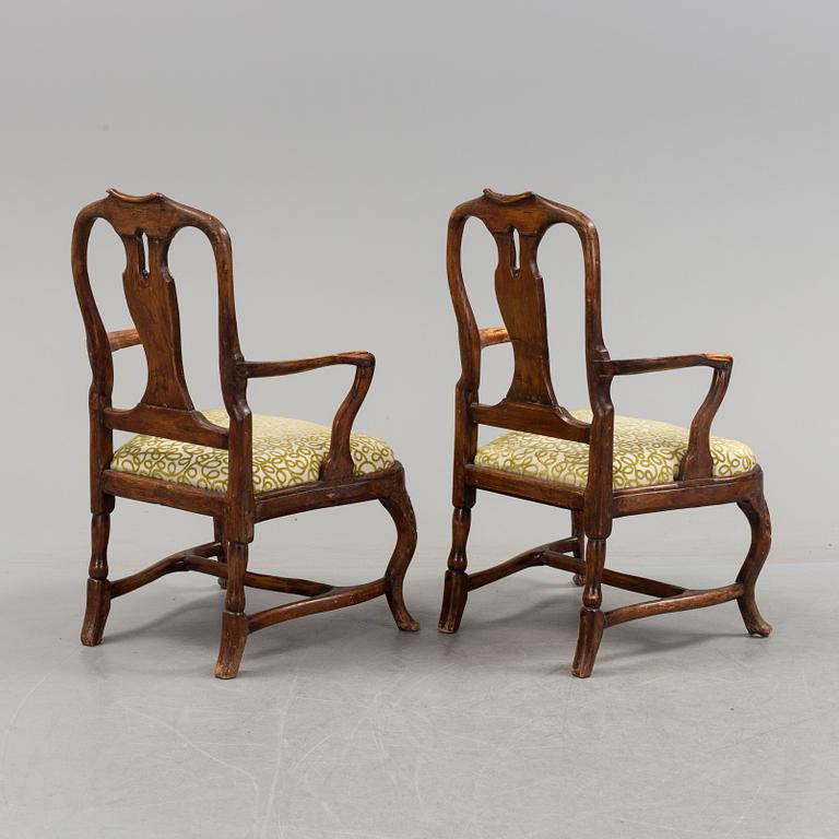 A pair of rococo arm chairs, later part of the 18th century.