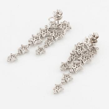 Earrings, in the shape of stars, with brilliant-cut diamonds.