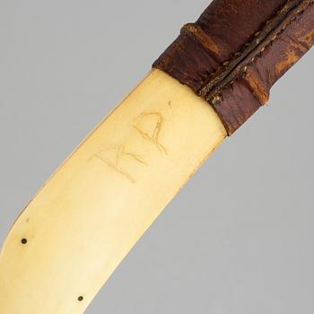 A Sami reinderr horn knife, signed RP.