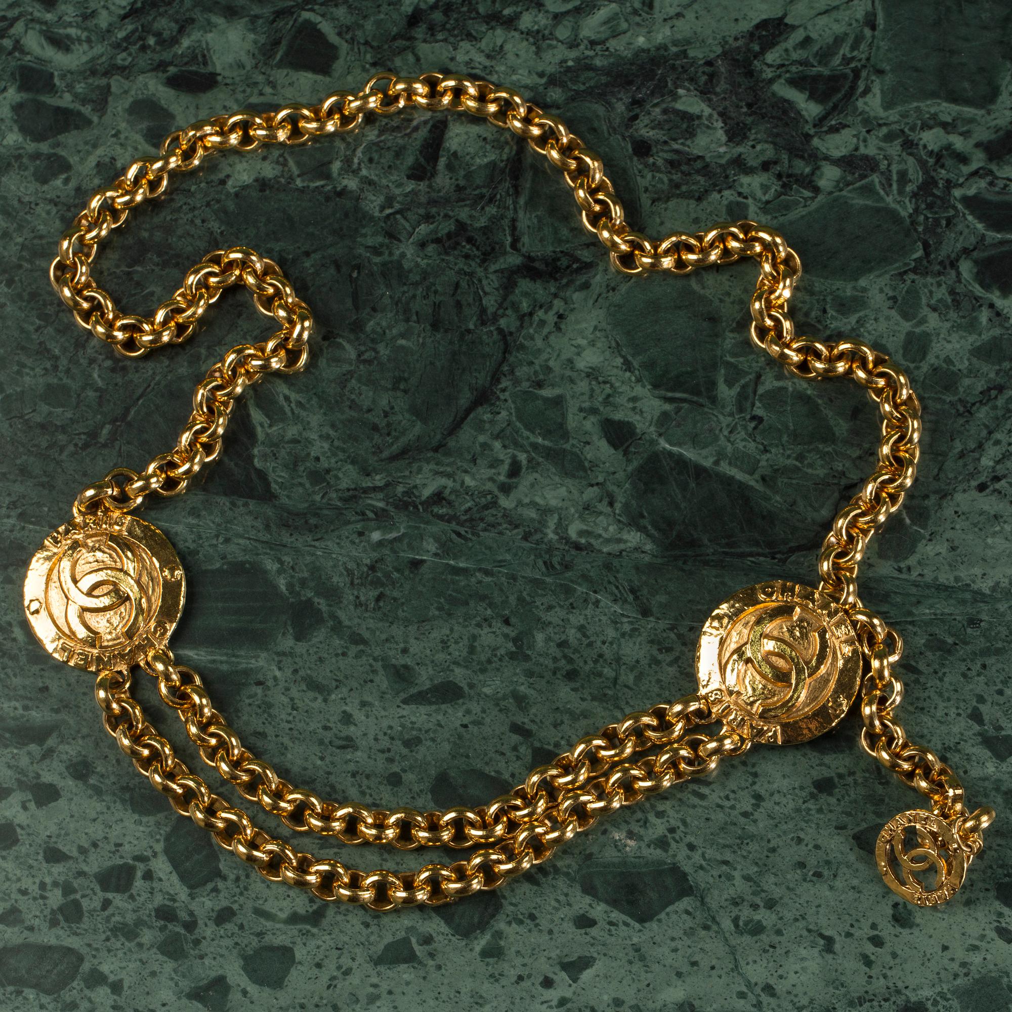 A belt by CHANEL.