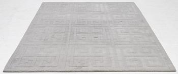 A 'Cubes' carpet, Layered, c. 270 x 180 cm.